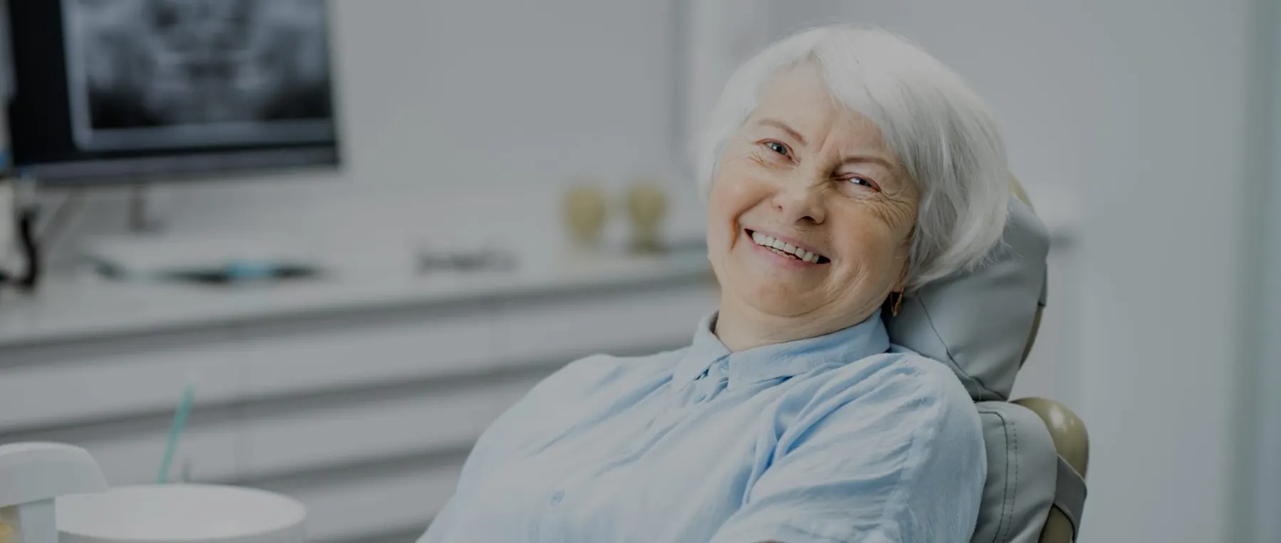 Senior patient smiling in the dental chair